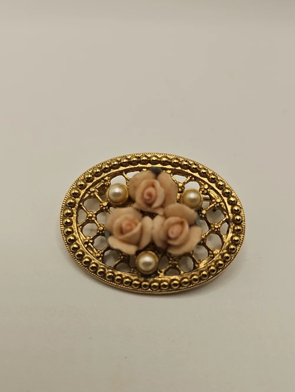 Gold-Tone Brooch with Cream Rose Cabochons